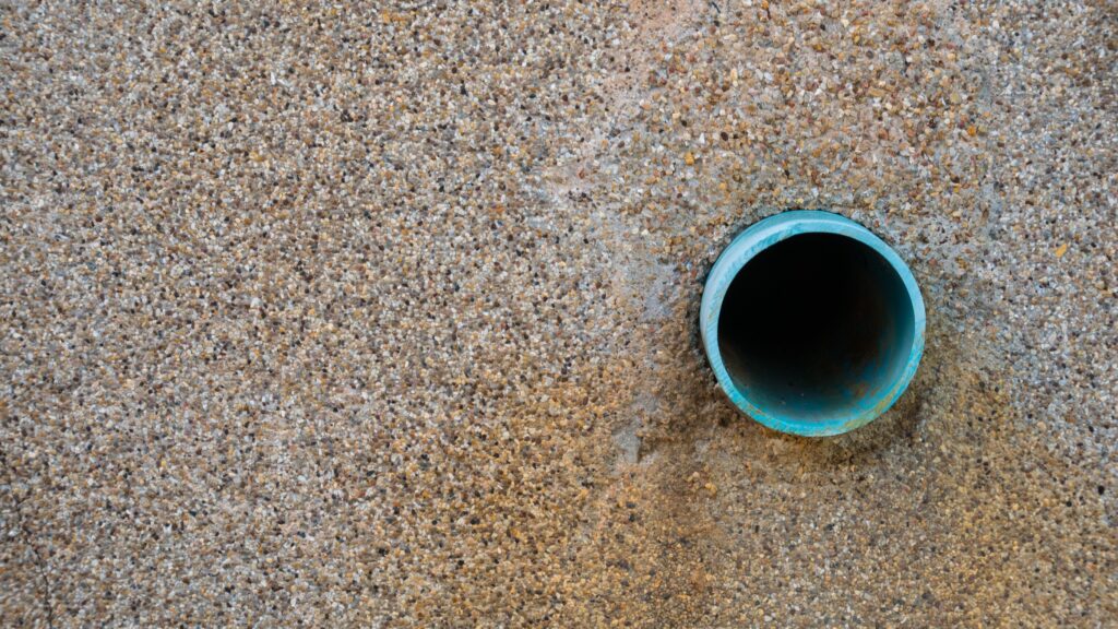 French drain pipe in the wall